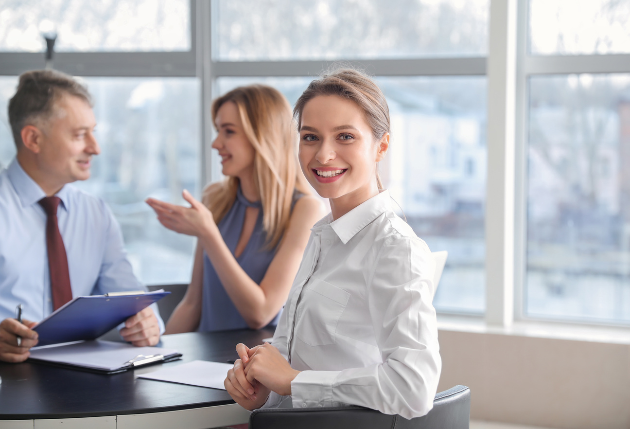 Human Resources Commission Interviewing Woman in Office